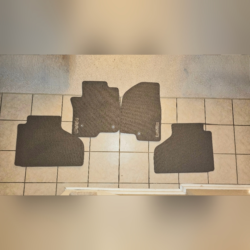 New 2021-2025 OEM 4-piece GMC Yukon Tahoe Floor Mat Set. Taupe.